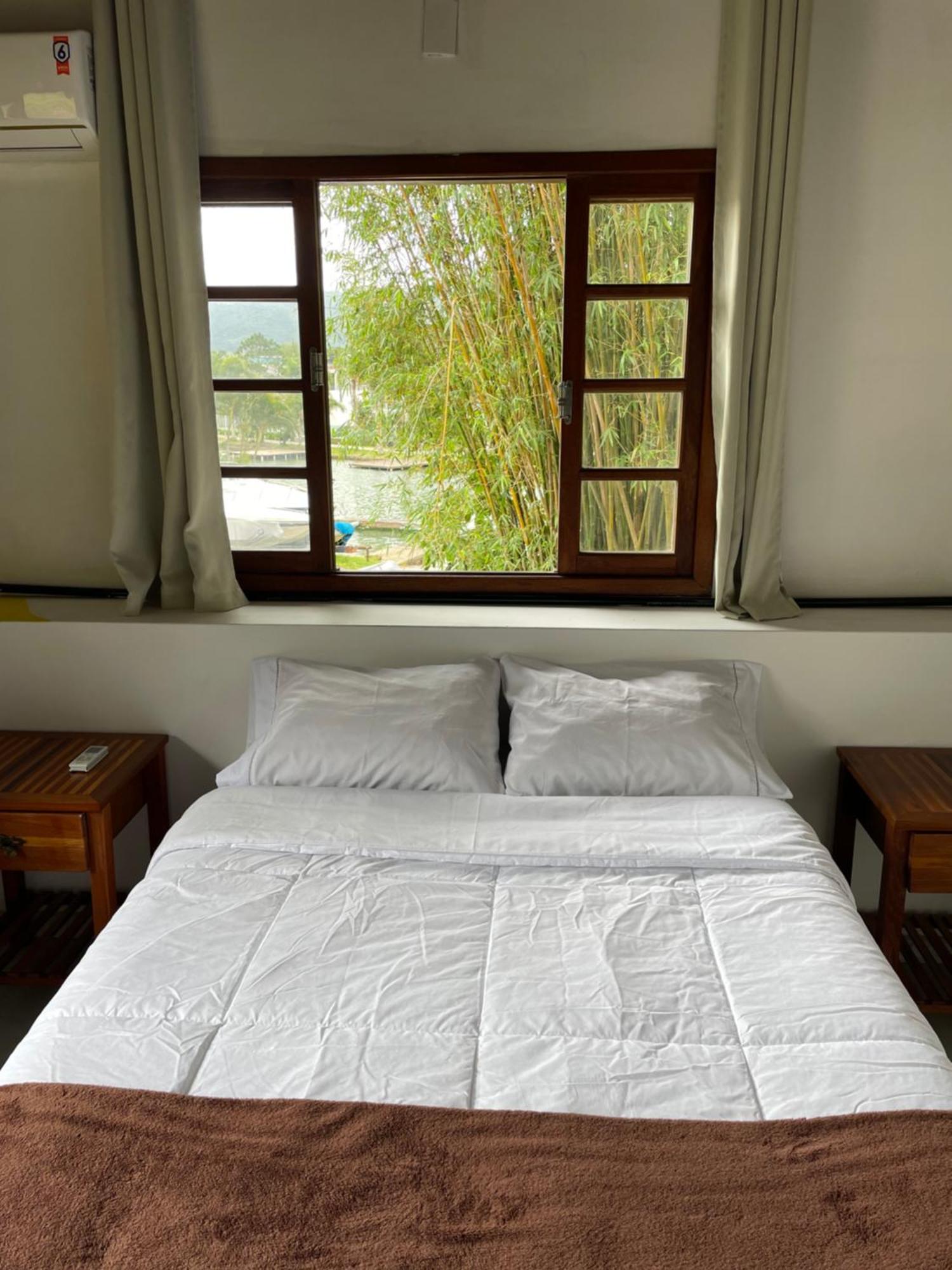 Nomades Riverside - Adventure & Coworking Hostal